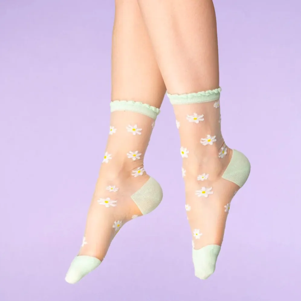 chaussettes transparentes paquerettes.webp