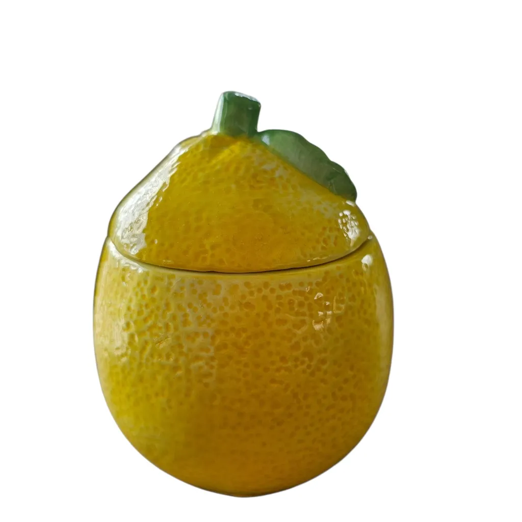 bougie citron vert dans pot céramique.webp